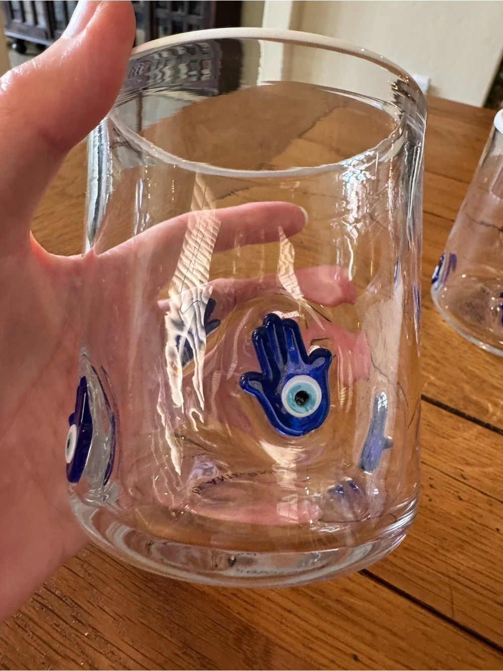 NWT Pair of Anthropologie Clear Juice Glass with Blue Hamsa Motifs